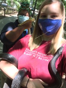Rebekah (background) and her girlfriend Amanda (foreground) working with snakes at Mecklenburg County Park and Recreation in Charlotte, North Carolina. 