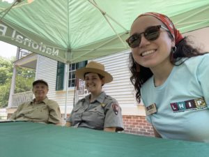 Latino Heritage Internship Program Intern Pia Cano with two fellow park rangers at the National Park Service tent at the Days Gone By event at Somerset Place in North Carolina.