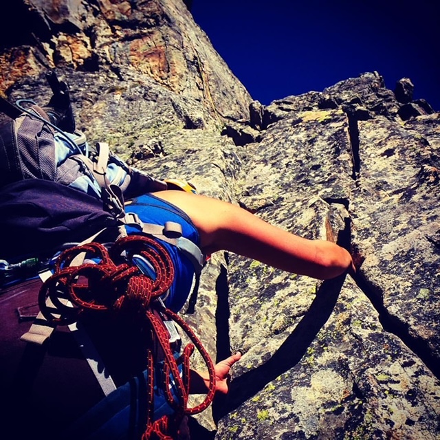 Nakita Lopez rock climbing.