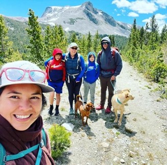 Nakita Lopez hiking with her family in the Sierra Nevada Mountains.
