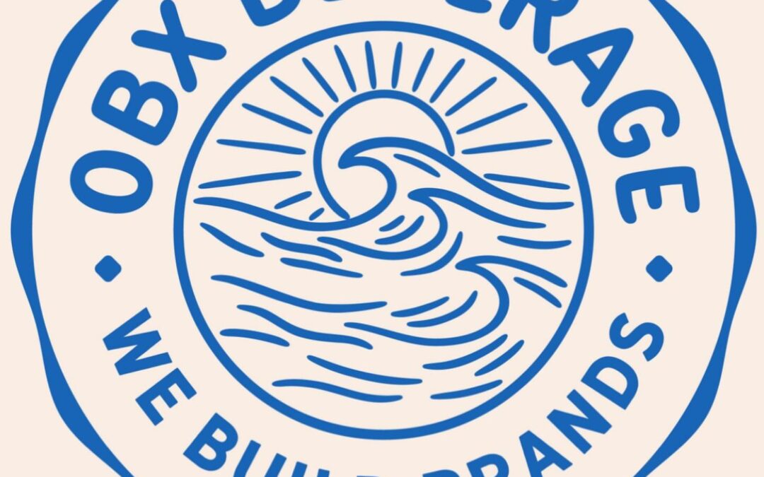 OBX Beverage logo, featuring a sun rising over waves enclosed in a circle. The text around the image says OBX Beverage, We Build Brands.