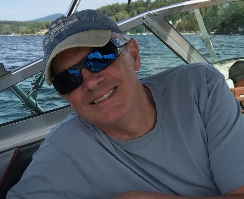 Dr. Paul Orser on a boat on Newfound Lake in New Hampshire.
