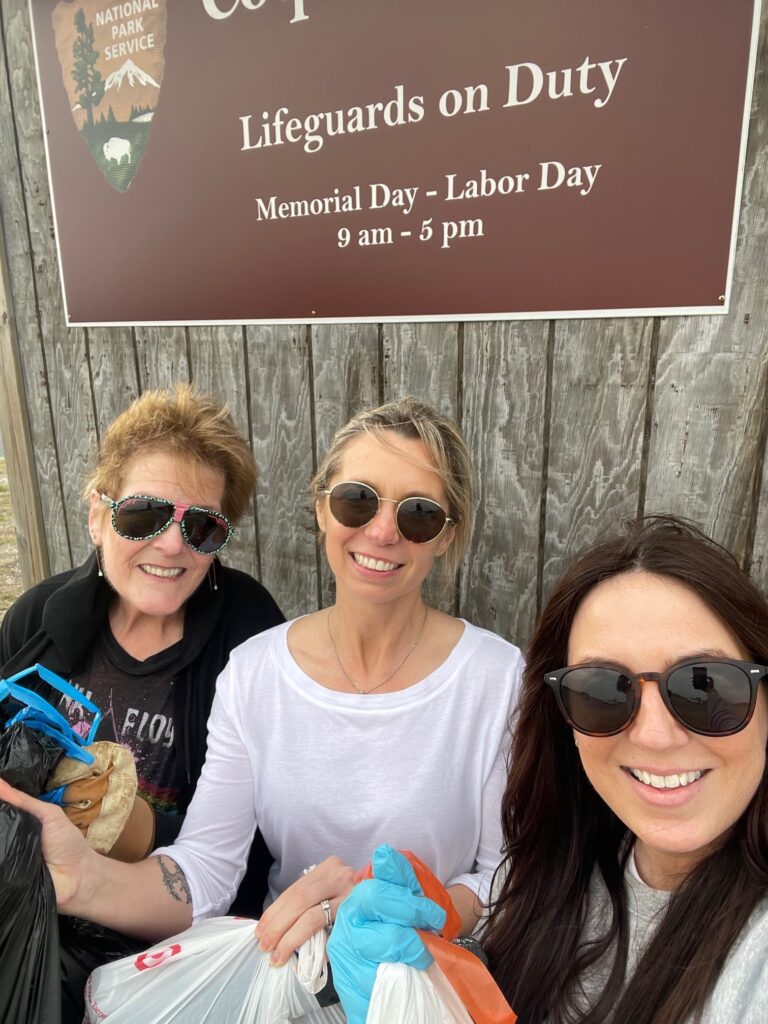 Shannon (center) and her coworkers participating in a beach cleanup at Coquina Beach Access on Cape Hatteras National Seashore.